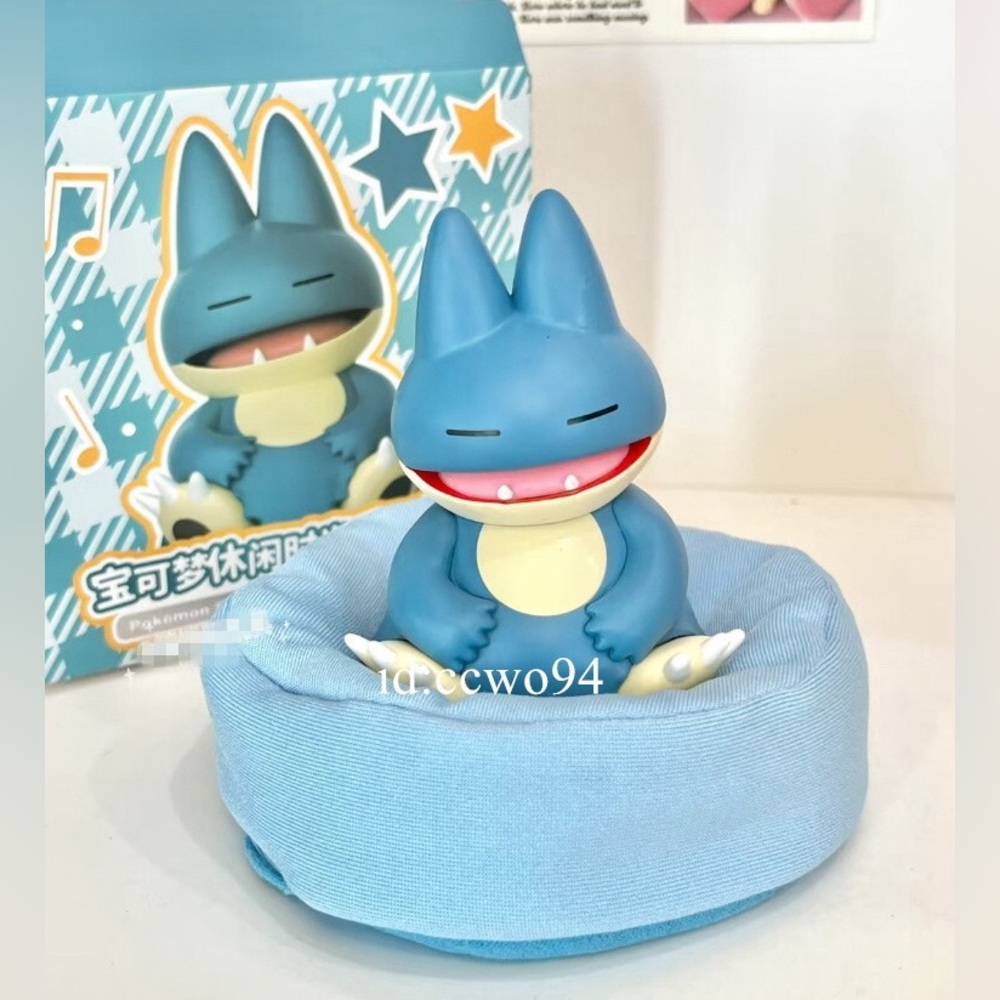 Pokemon sleeping Munchlax (pre-evolution of Snorlax) on beanbag bed figure (NIB)